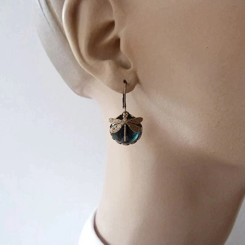 Orecchini a forma di libellula con cristalli d'oro antico