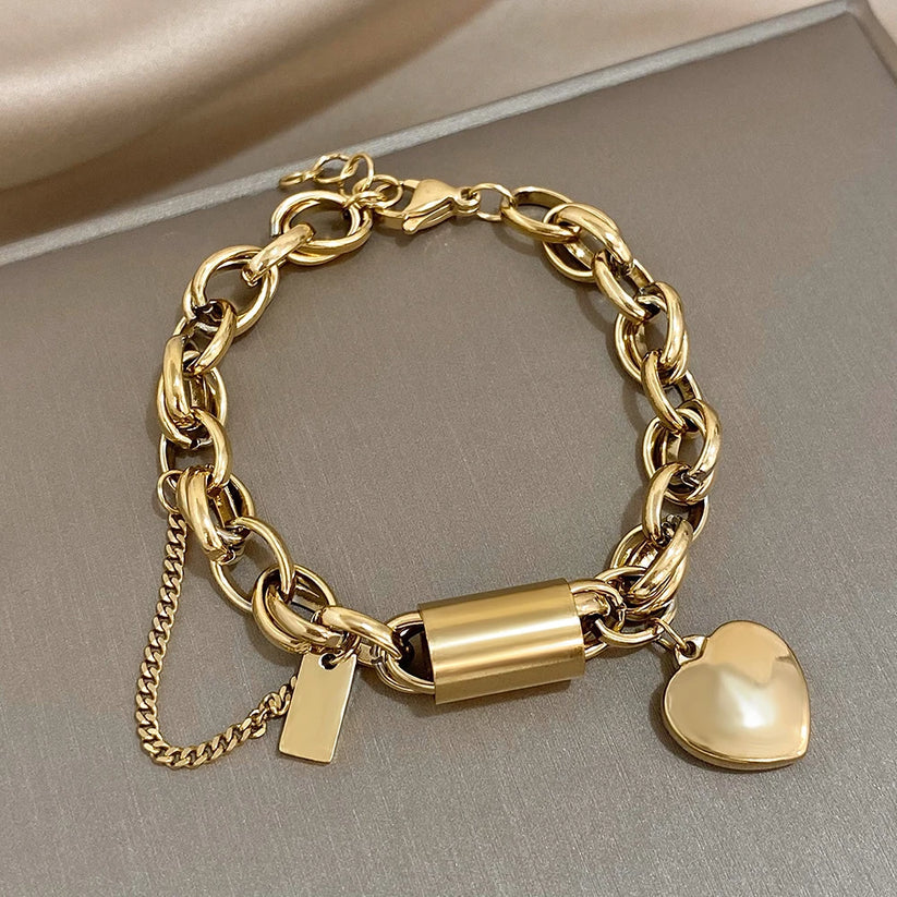 Bracciale spesso Heartened | Oro bianco