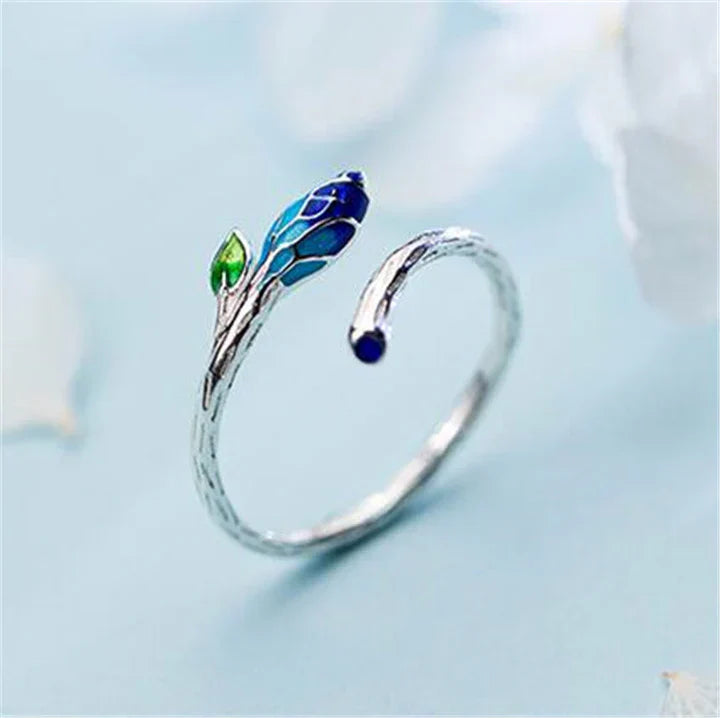 Anello regolabile foglia con smalto blu in argento