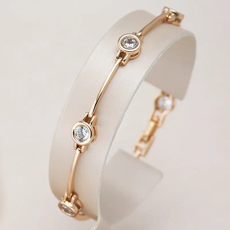 Elegante braccialetto con zirconi in oro