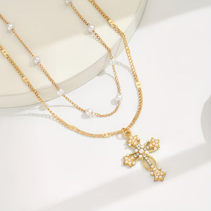 Collana con ciondolo croce multistrato