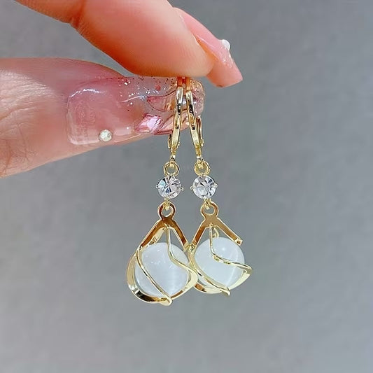 Eleganti orecchini con nappa e pietra