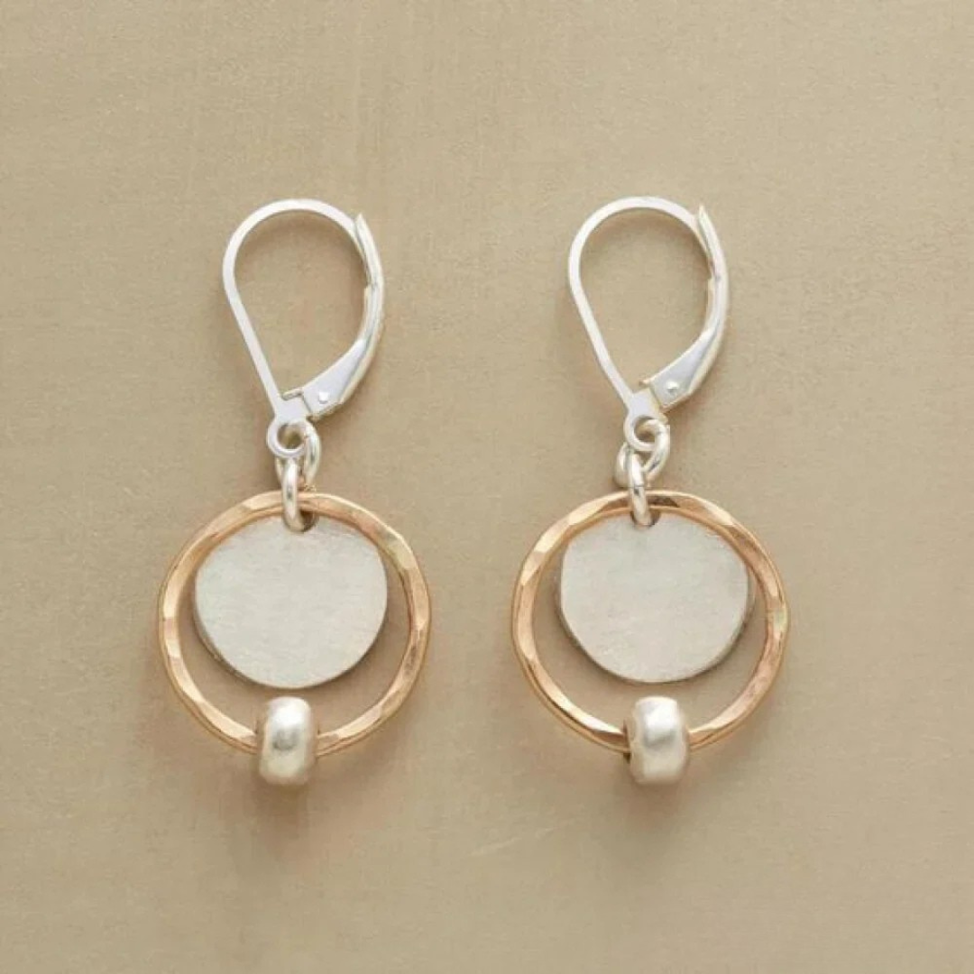 Orecchini eleganti in oro e perle d'argento