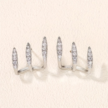 Orecchini a bottone eleganti in strass con tre griffe