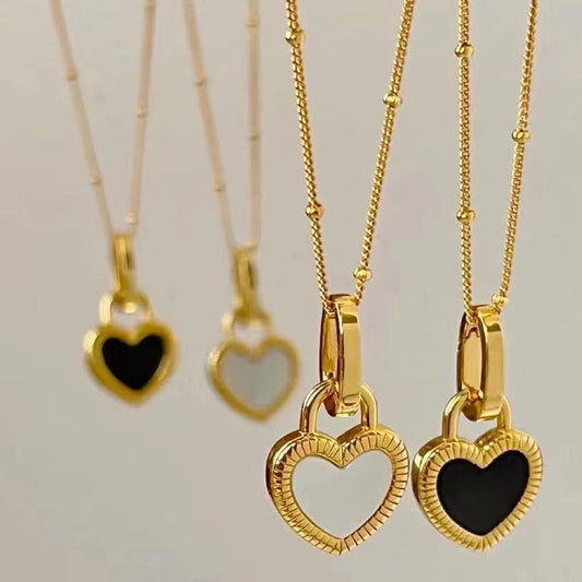 Collana con Ciondolo Cuore Nero e Bianco in Oro