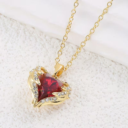 Collana cuore di rubino Angel Embrace | Oro