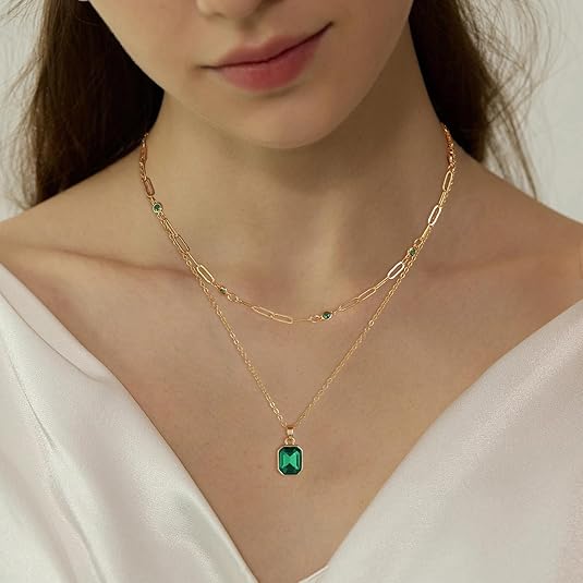 Collana con ciondolo trifoglio smeraldo | Oro