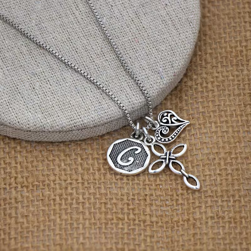 Collana cuore e croce con iniziale