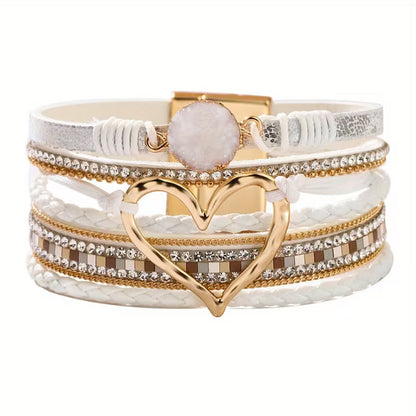 Bracciale bohémien multistrato con cuore dorato