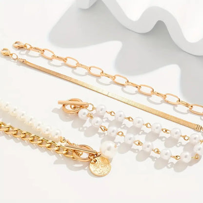 Set Braccialetti Chic Gold 4 Pezzi - Serpente, Perle e Maglie | Dorato