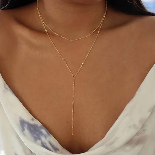 Collana Doppio Strato con Perline e Nappe Geometriche