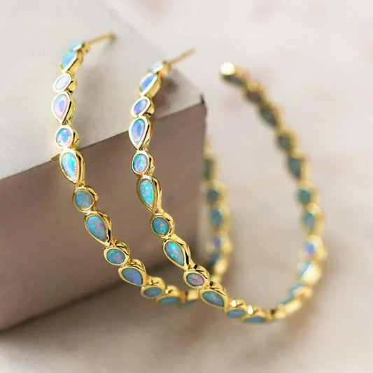 Orecchini vintage in oro con opale blu