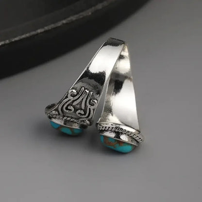 Elegante Anello Vintage a Croce con Turchese