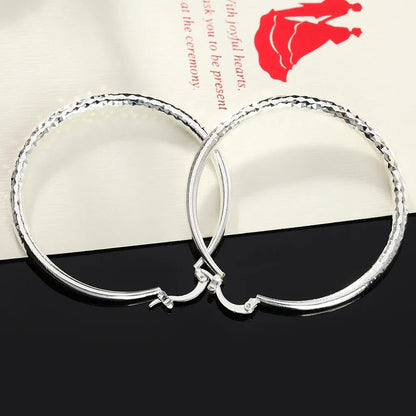 Orecchini a cerchio in argento sterling