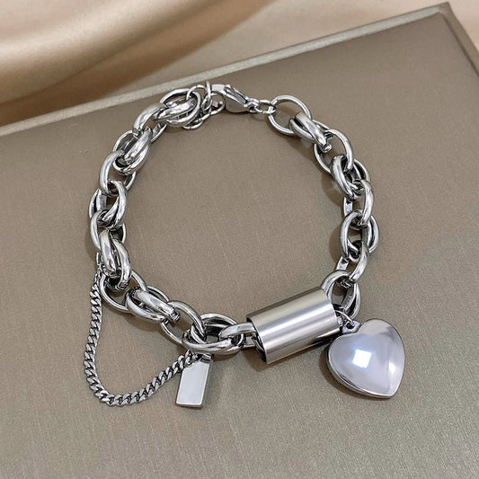 Bracciale spesso Heartened | Oro bianco