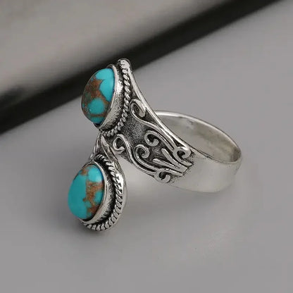 Elegante Anello Vintage a Croce con Turchese
