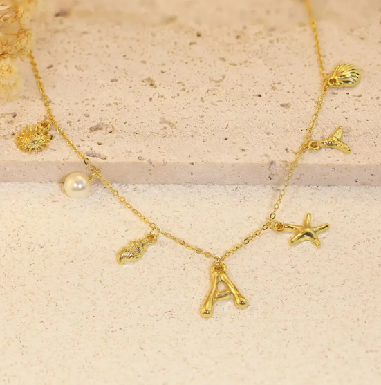Collana Lettera Bambù con Stella Marina e Conchiglia