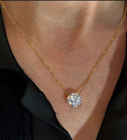 Collana con Zaffiro Bianco Taglio Rotondo in Oro