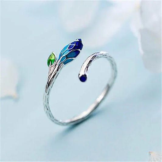 Anello regolabile foglia con smalto blu in argento