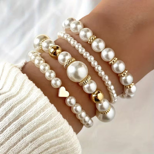 Elegante set di 4 bracciali di perle