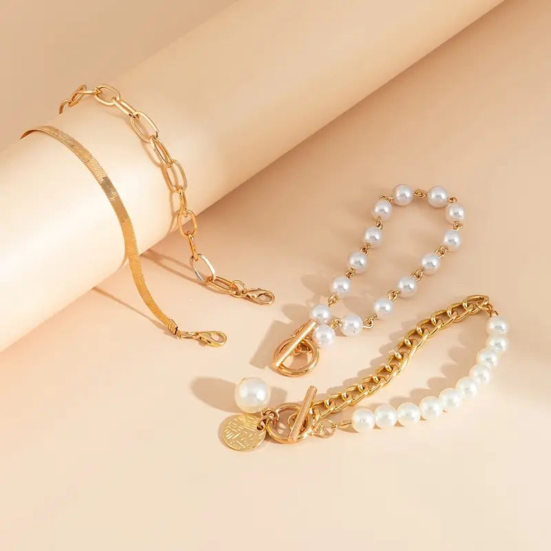 Set Braccialetti Chic Gold 4 Pezzi - Serpente, Perle e Maglie | Dorato
