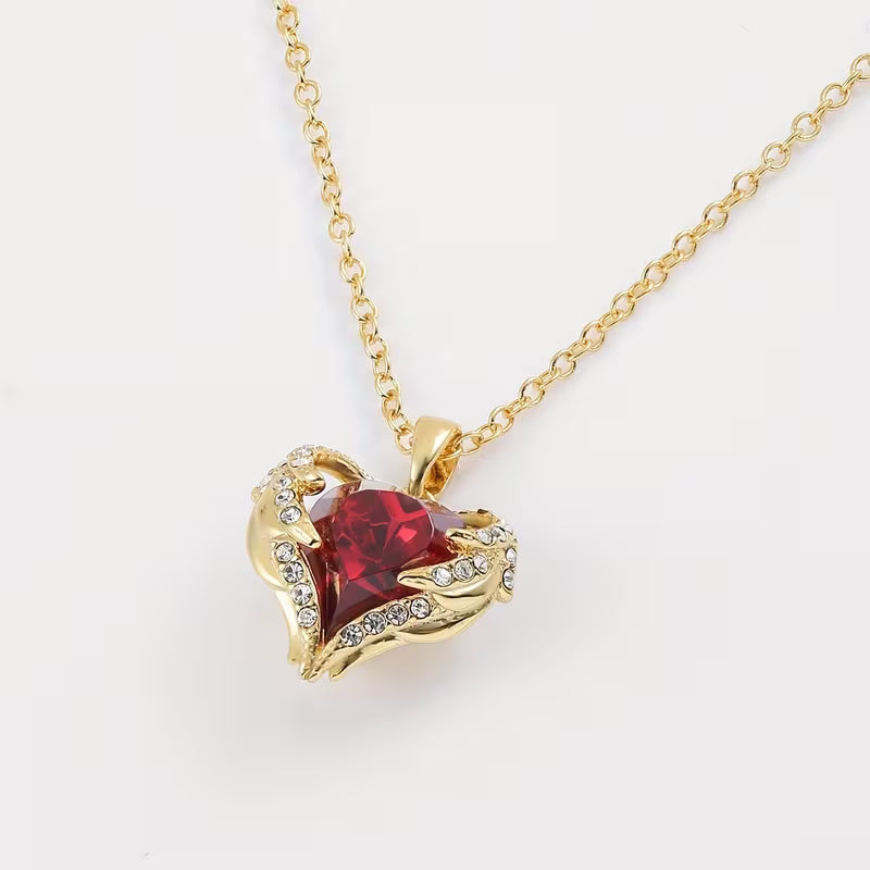 Collana cuore di rubino Angel Embrace | Oro