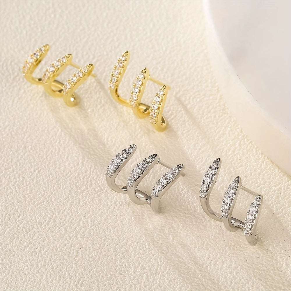 Orecchini a bottone eleganti in strass con tre griffe