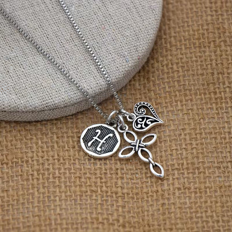 Collana cuore e croce con iniziale