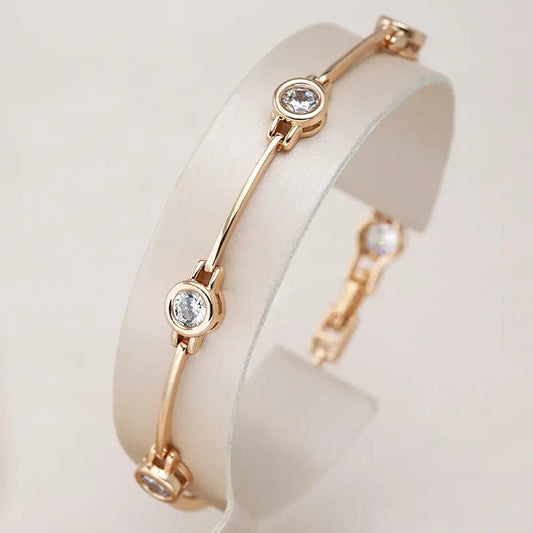 Elegante bracciale in zirconi dorati