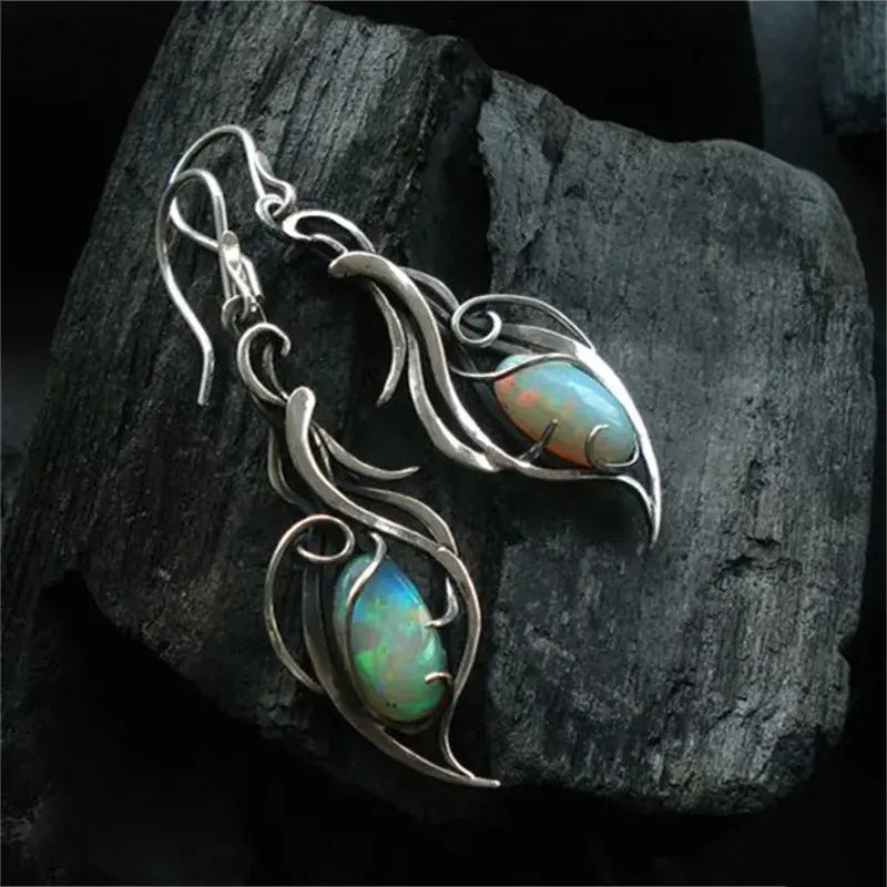 Orecchini vintage in opale blu su argento