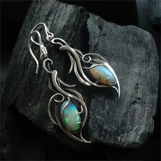 Orecchini vintage in opale blu su argento