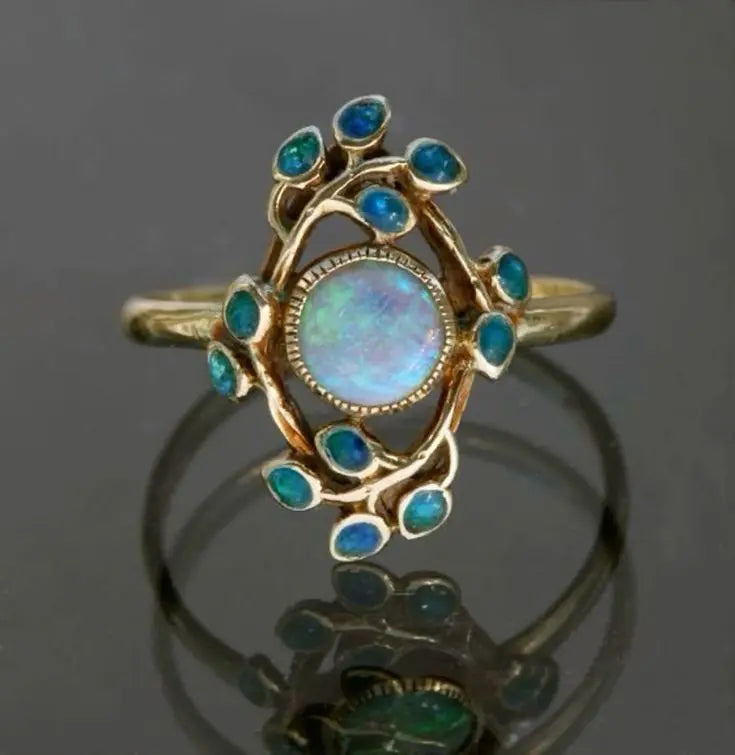 Anello blu vintage con cristalli e opale